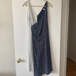 Navy and white polka dot asymmetrical midi dress